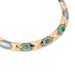 Collier torque BULGARI en or jaune, hématite et émeraudes - Castafiore