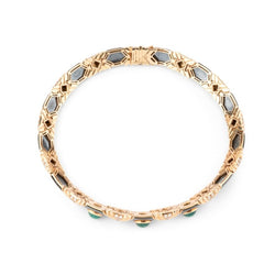Collier torque BULGARI en or jaune, hématite et émeraudes - Castafiore