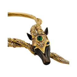 Collier Torque CHAUMET "Filly Princess" en or jaune, bronze, émeraude, saphirs et diamants - Castafiore