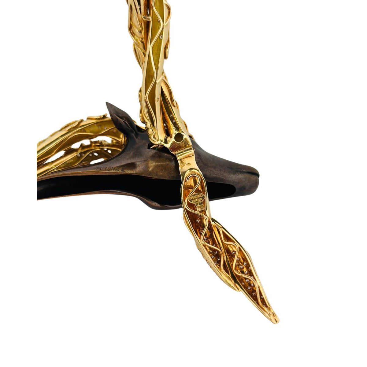 Collier Torque CHAUMET "Filly Princess" en or jaune, bronze, émeraude, saphirs et diamants - Castafiore