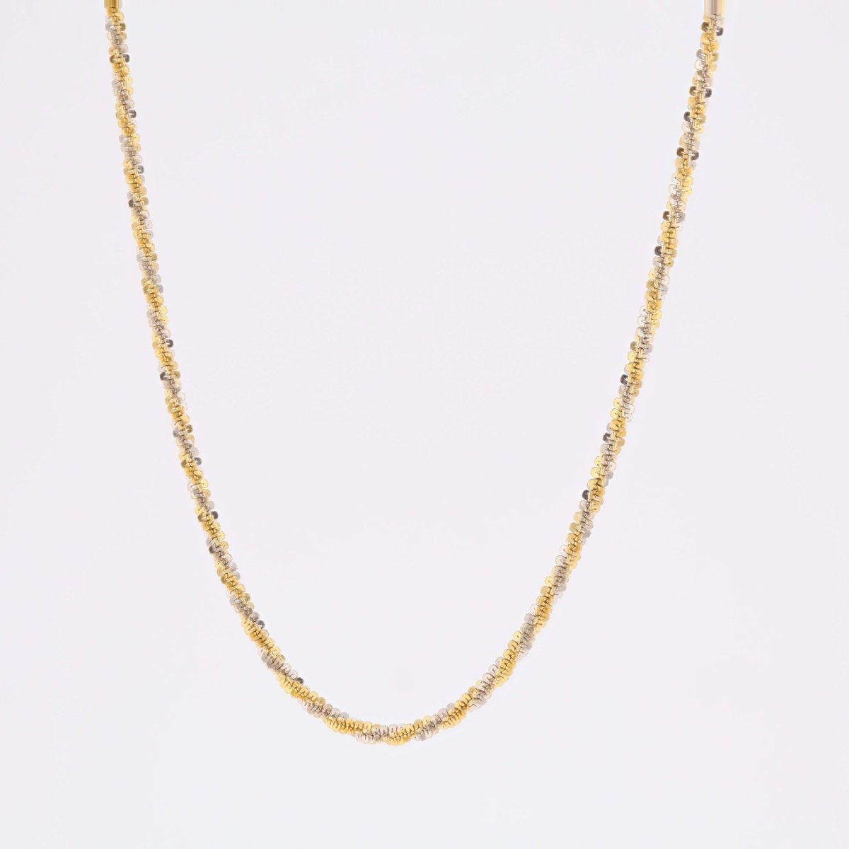 Collier torsadée en or jaune et or blanc - Castafiore