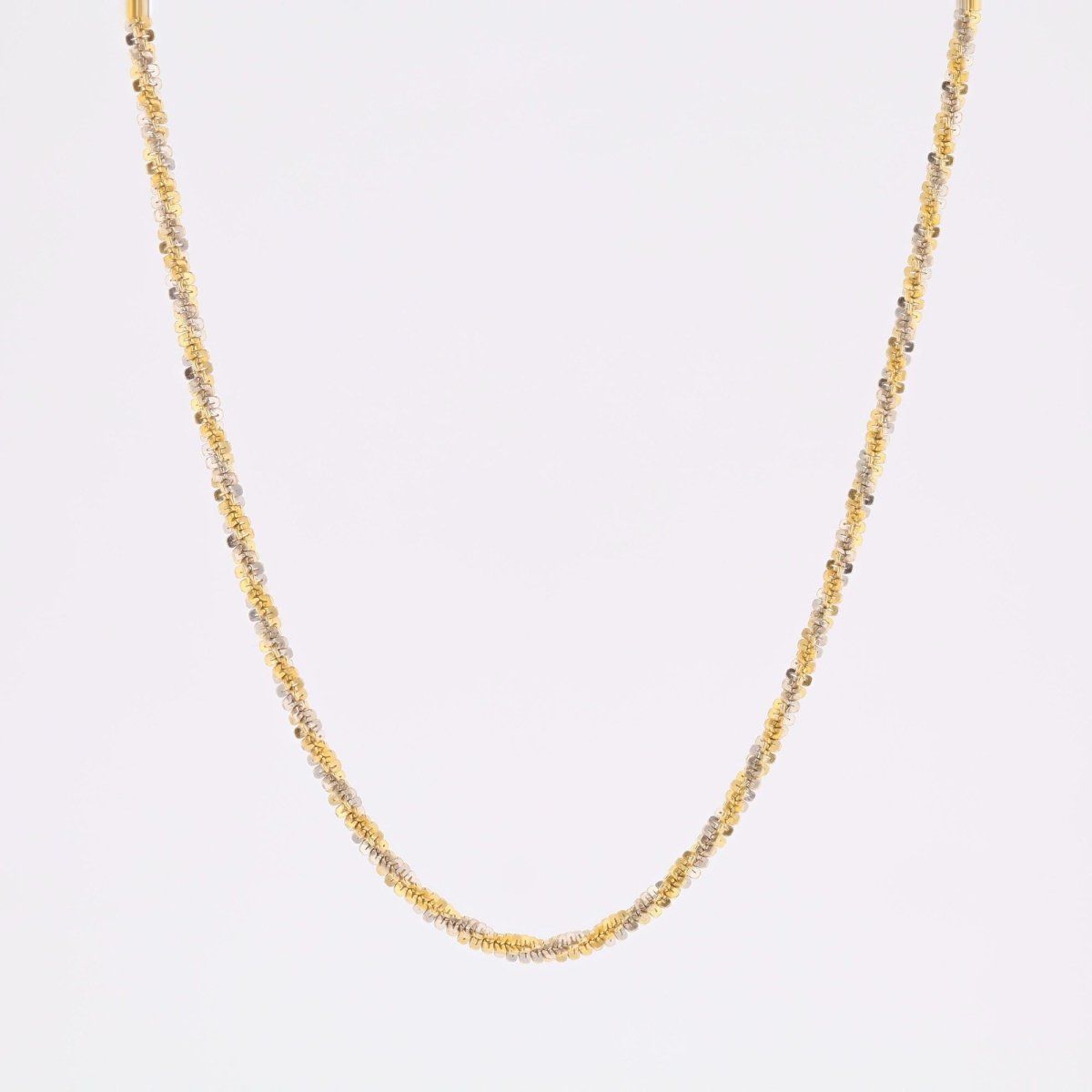 Collier torsadée en or jaune et or blanc - Castafiore