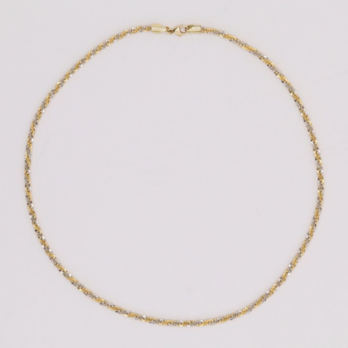Collier torsadée en or jaune et or blanc - Castafiore