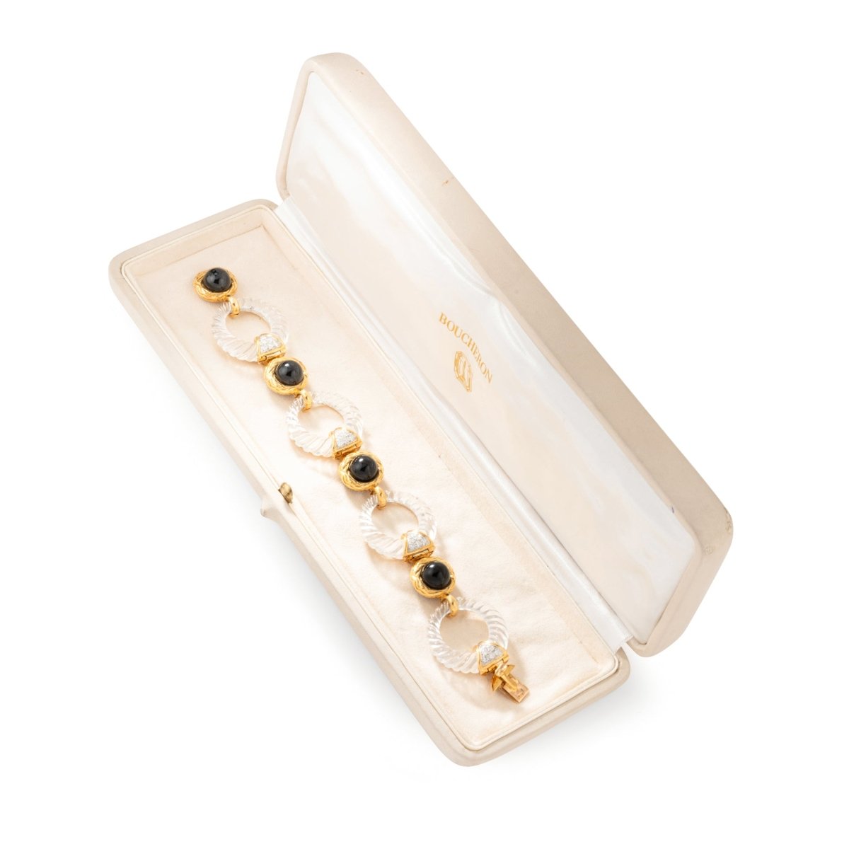 Collier transformable BOUCHERON en or jaune, onyx, cristal de roche et diamants - Castafiore