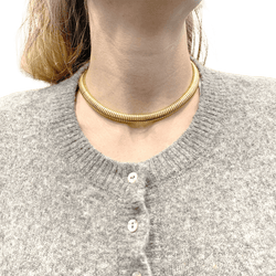 Collier, "Tubogas", or jaune. - Castafiore