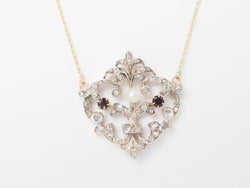 Collier volutes en or jaune et argent, grenat diamants et perle - Castafiore