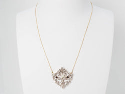 Collier volutes en or jaune et argent, grenat diamants et perle - Castafiore