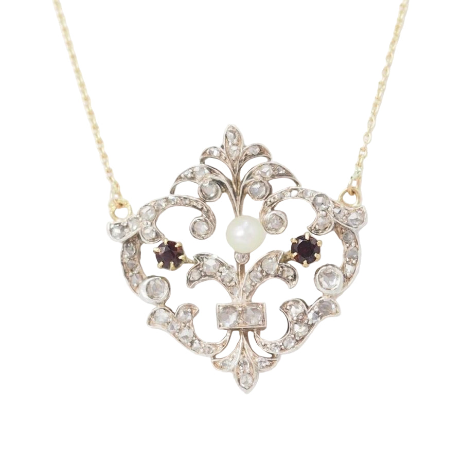 Collier volutes en or jaune et argent, grenat diamants et perle - Castafiore