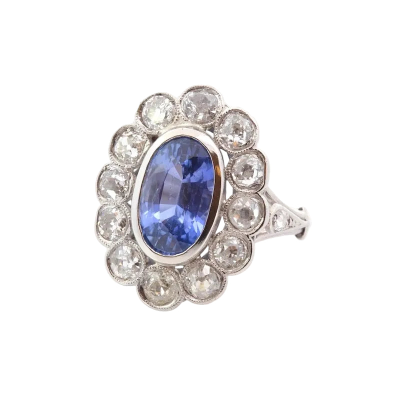 Bague Marguerite en platine, saphir et diamants