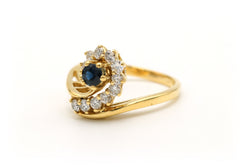 Bague Entourage en or jaune, saphir et diamants