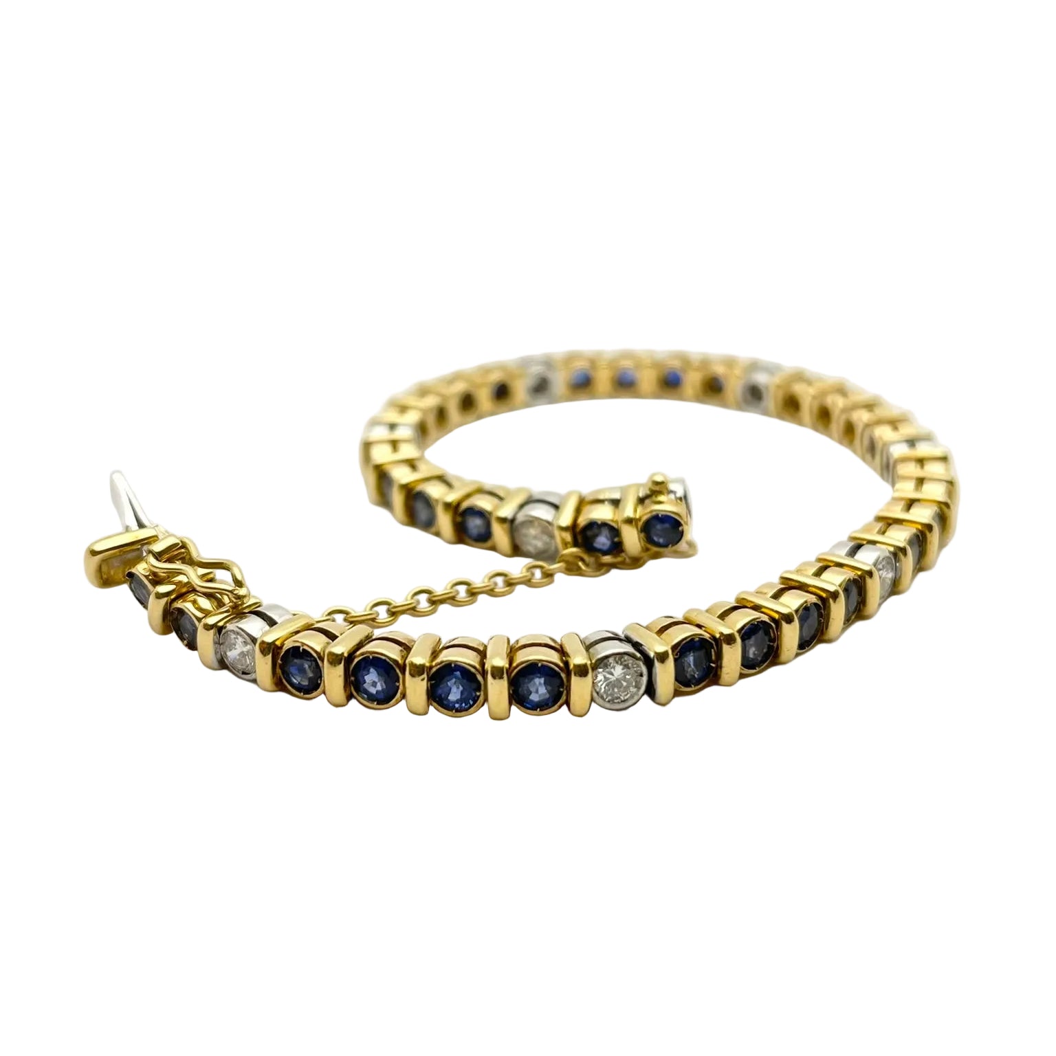 Bracelet Ligne en or blanc, or jaune, saphirs et diamants