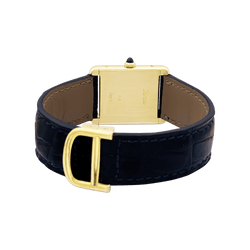 Montre Cartier, "Tank Louis Cartier", or jaune, bracelet cuir.