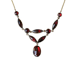 Collier Draperie en or jaune, or rose et grenats