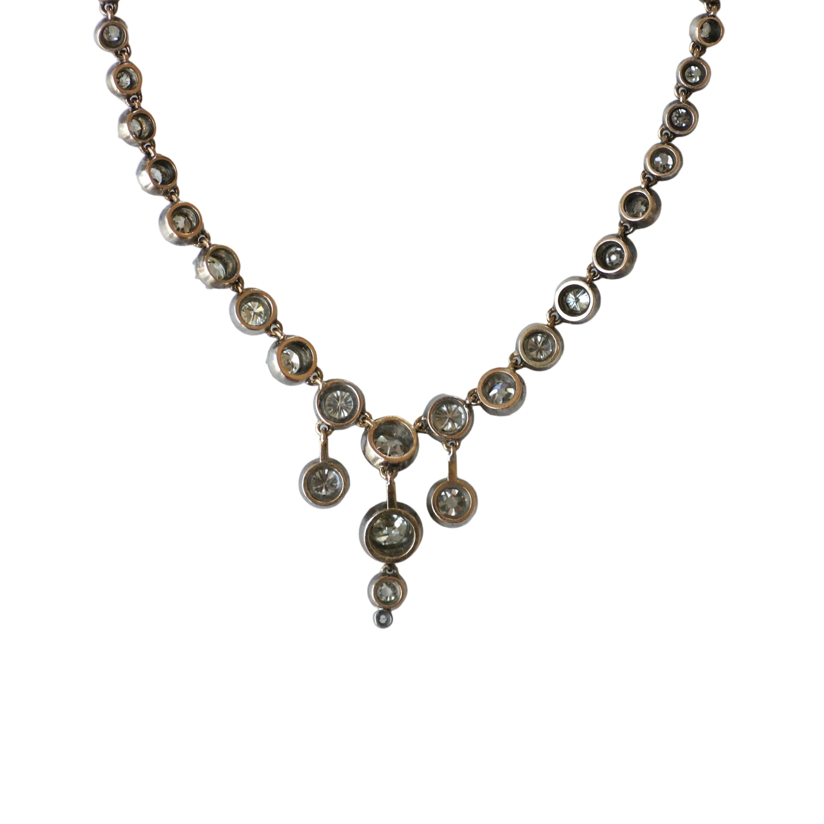 Collier Rivière en or jaune, or rose, argent et diamants