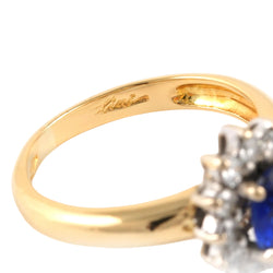 Bague Entourage en or jaune, saphir et zirconiums