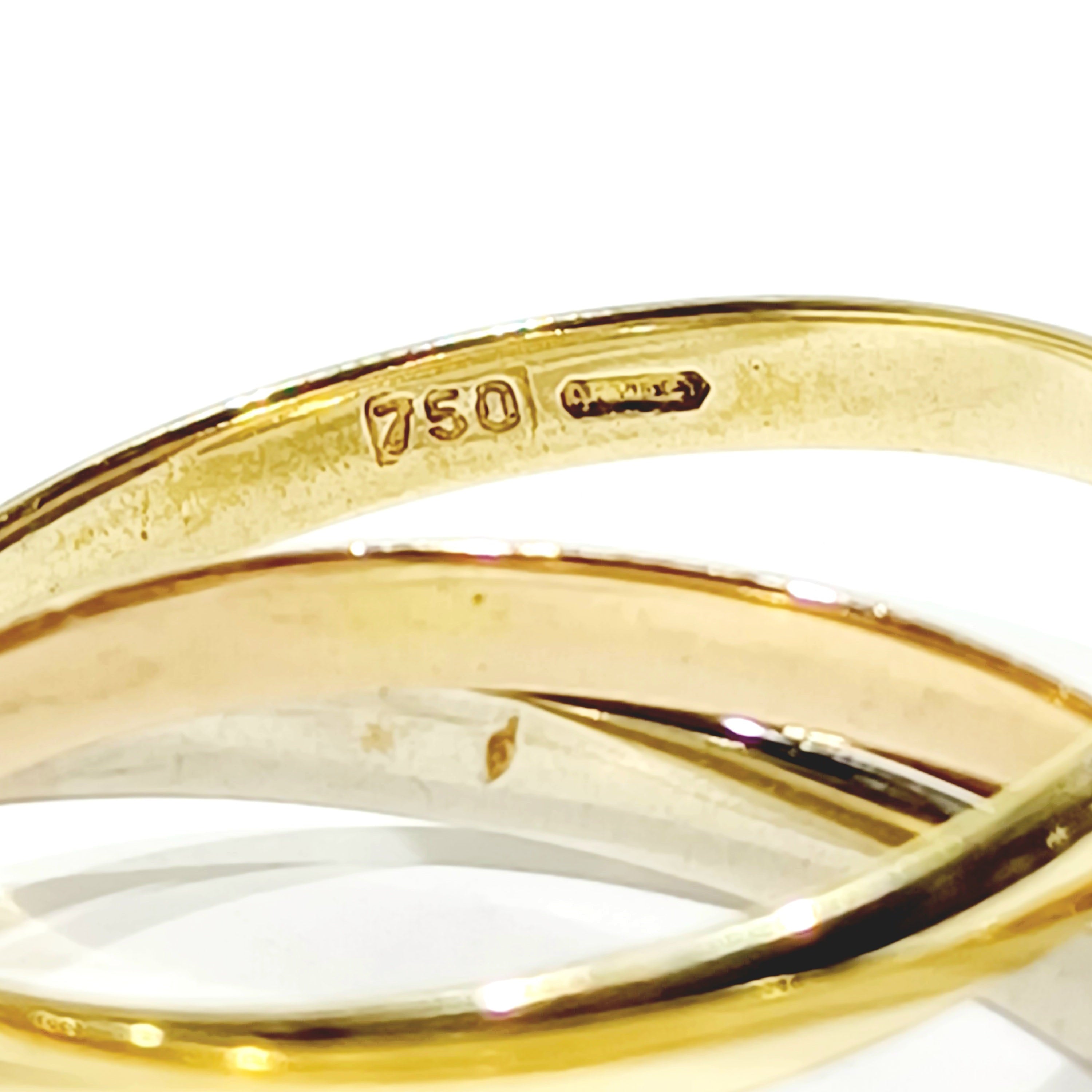 Ring in yellow gold, rose gold, and white gold