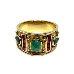 Bague Bandeau en or jaune, émeraude, rubis et saphirs