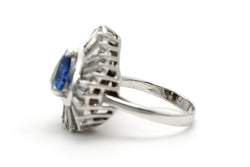 Bague Entourage en or blanc, saphir et diamants