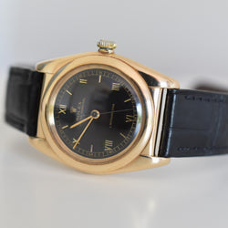 Montre ROLEX "Oyster Perpetual Bubbleback Ovetto" en or jaune et cuir