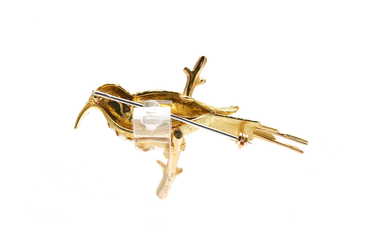 Broche Épingle en or jaune, perles et rubis