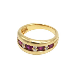 Bague Bandeau en or jaune, rubis et diamants