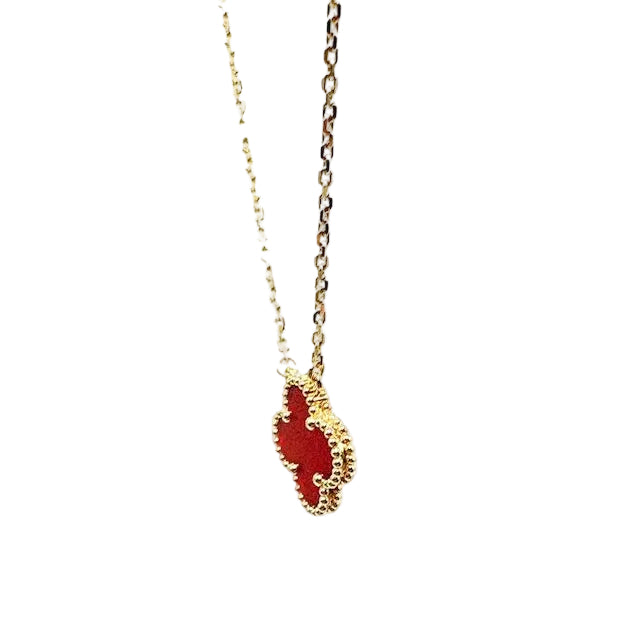 Collier Pendentif VAN CLEEF & ARPELS "Vintage Alhambra" en or jaune et cornaline
