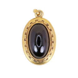 Pendentif en or jaune et grenat
