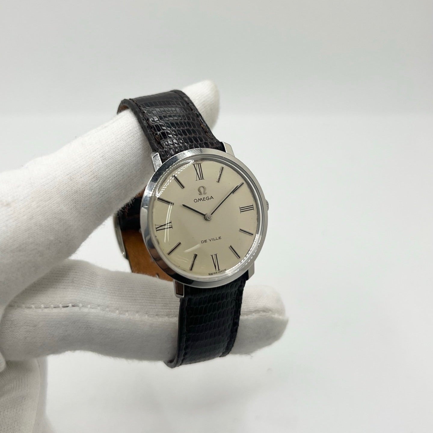 Montre OMEGA "De Ville" en acier et cuir