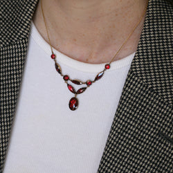 Collier Draperie en or jaune, or rose et grenats