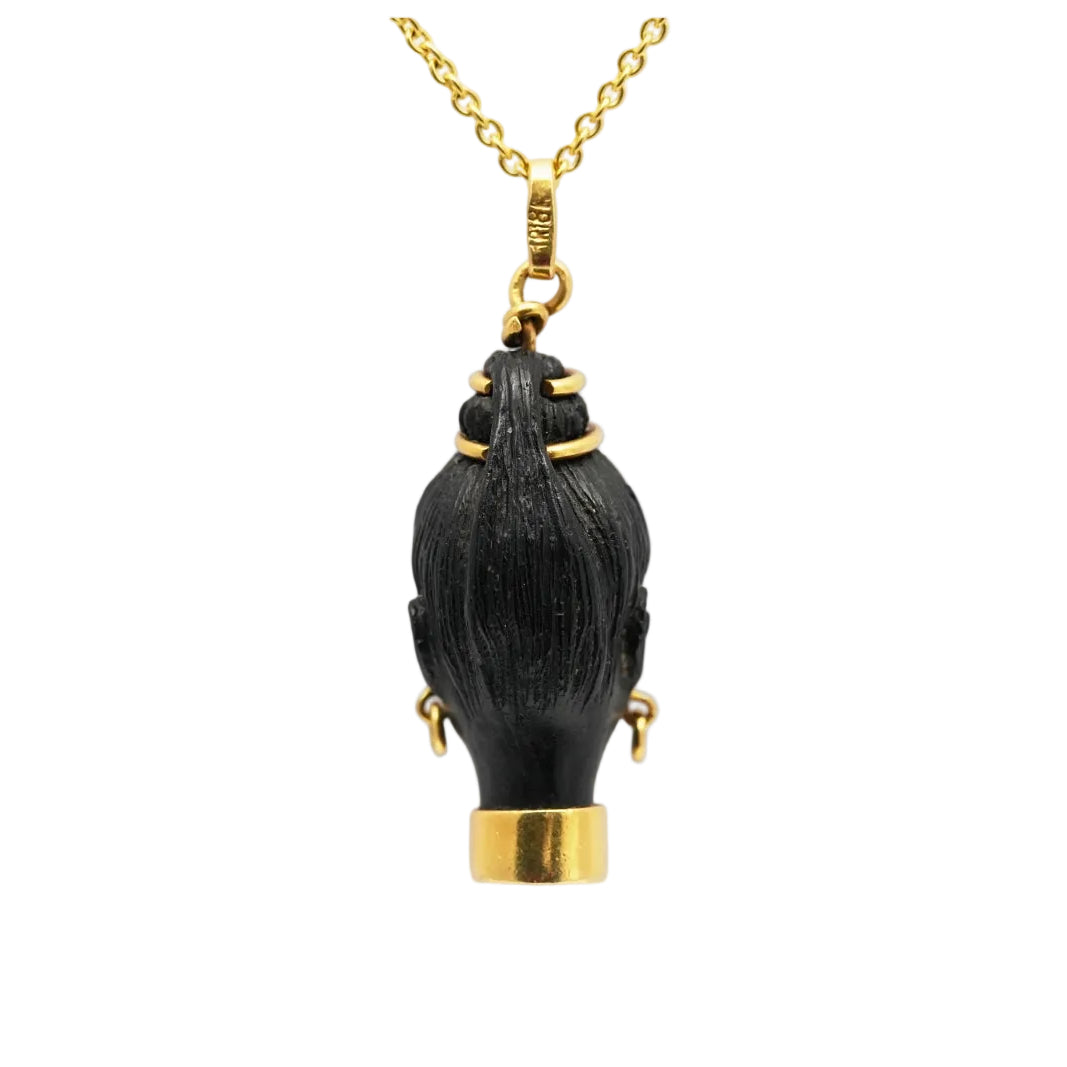 Pendentif en or jaune, ébène et turquoise
