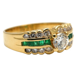 Bague Bandeau en or jaune, émeraudes et diamants
