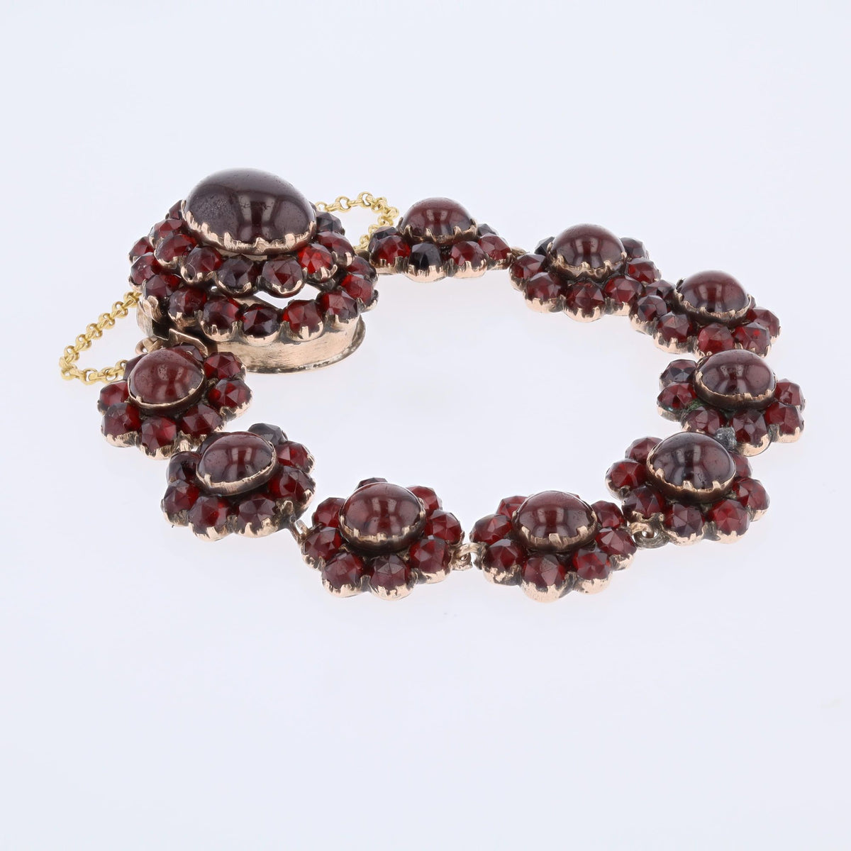 Bracelet en or jaune, argent et grenats