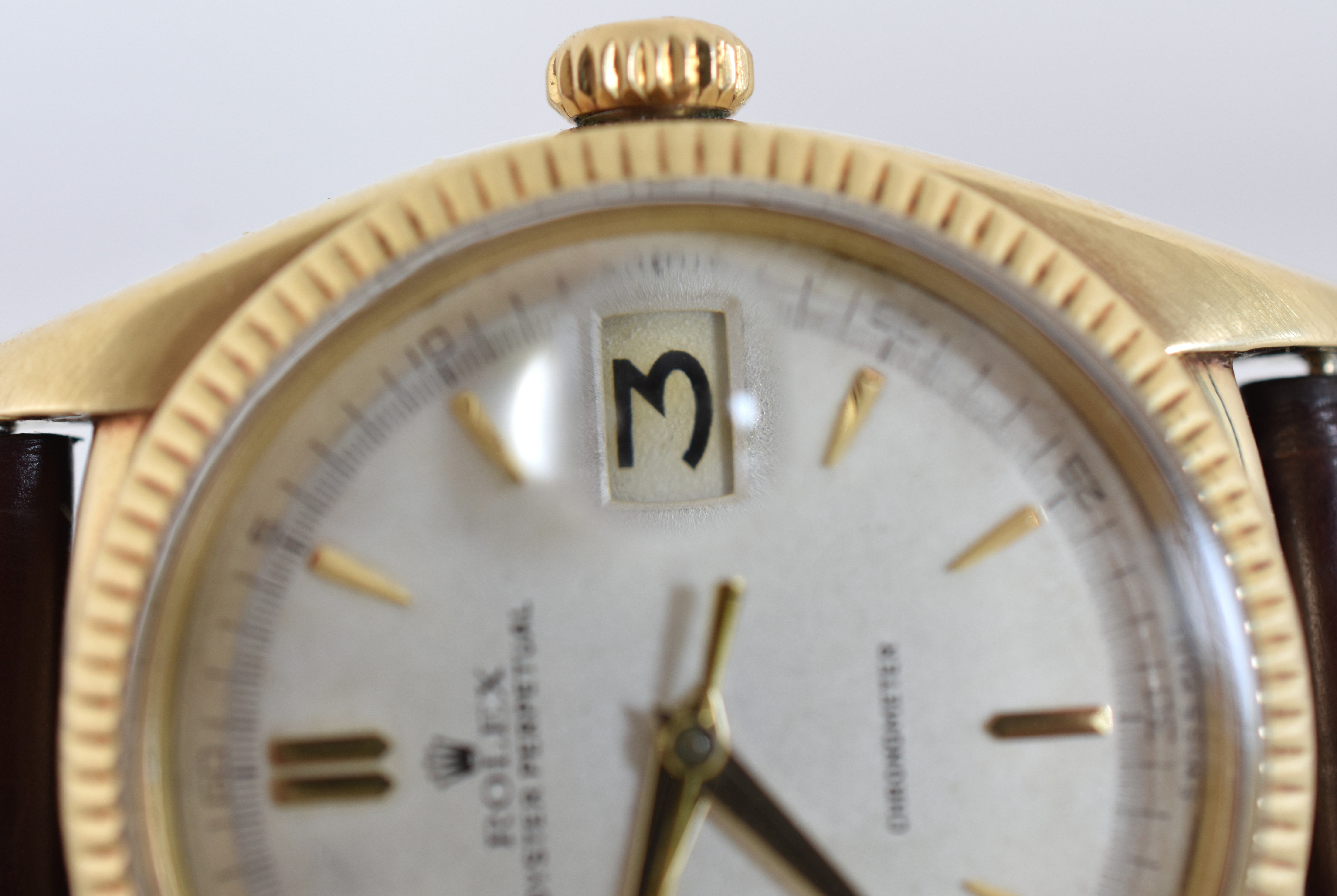 Montre ROLEX "Oyster Perpetual Date Ovettone" en or jaune et cuir