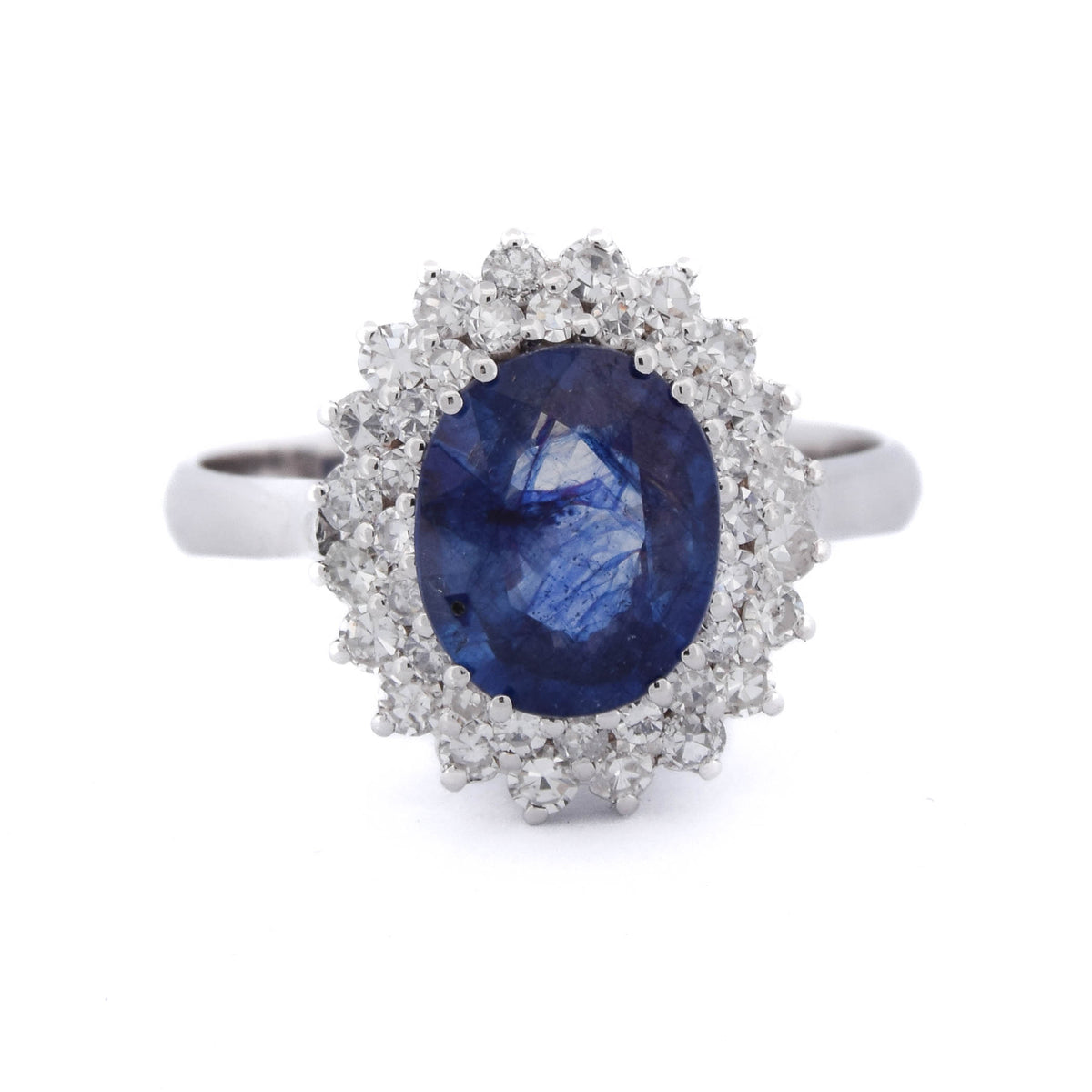 Bague Entourage en or blanc, saphir et diamants