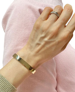 DINH VAN Bracelet jonc signé en or jaune 18k