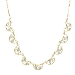 Draperie filigrane en or jaune - Castafiore