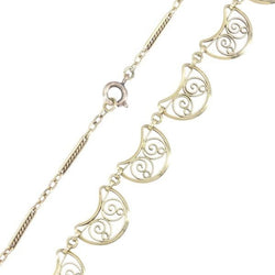 Draperie filigrane en or jaune - Castafiore