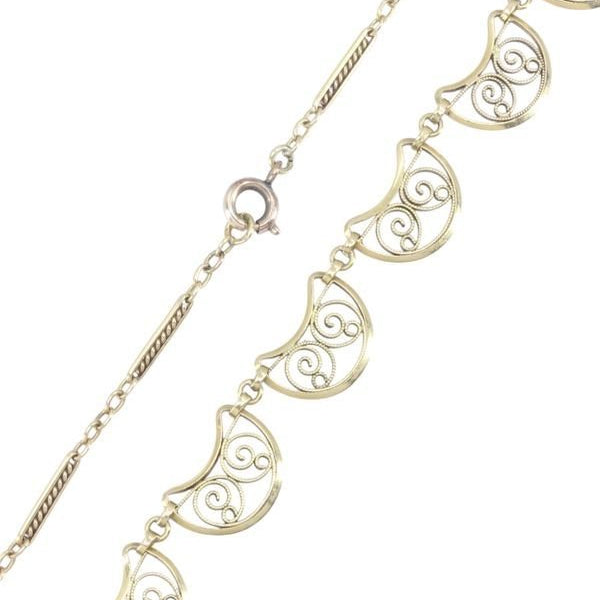 Draperie filigrane en or jaune - Castafiore