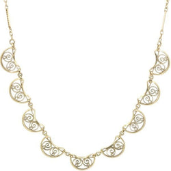 Draperie filigrane en or jaune - Castafiore