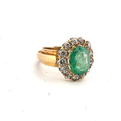 Bague Entourage en or jaune, émeraude et diamants