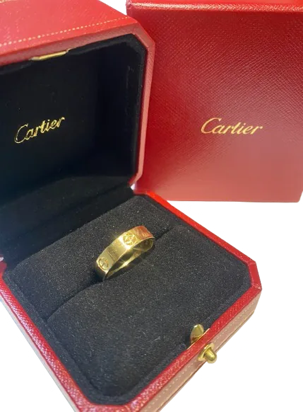 Collier Pendentif CARTIER Amulette en or blanc, nacre et diamant
