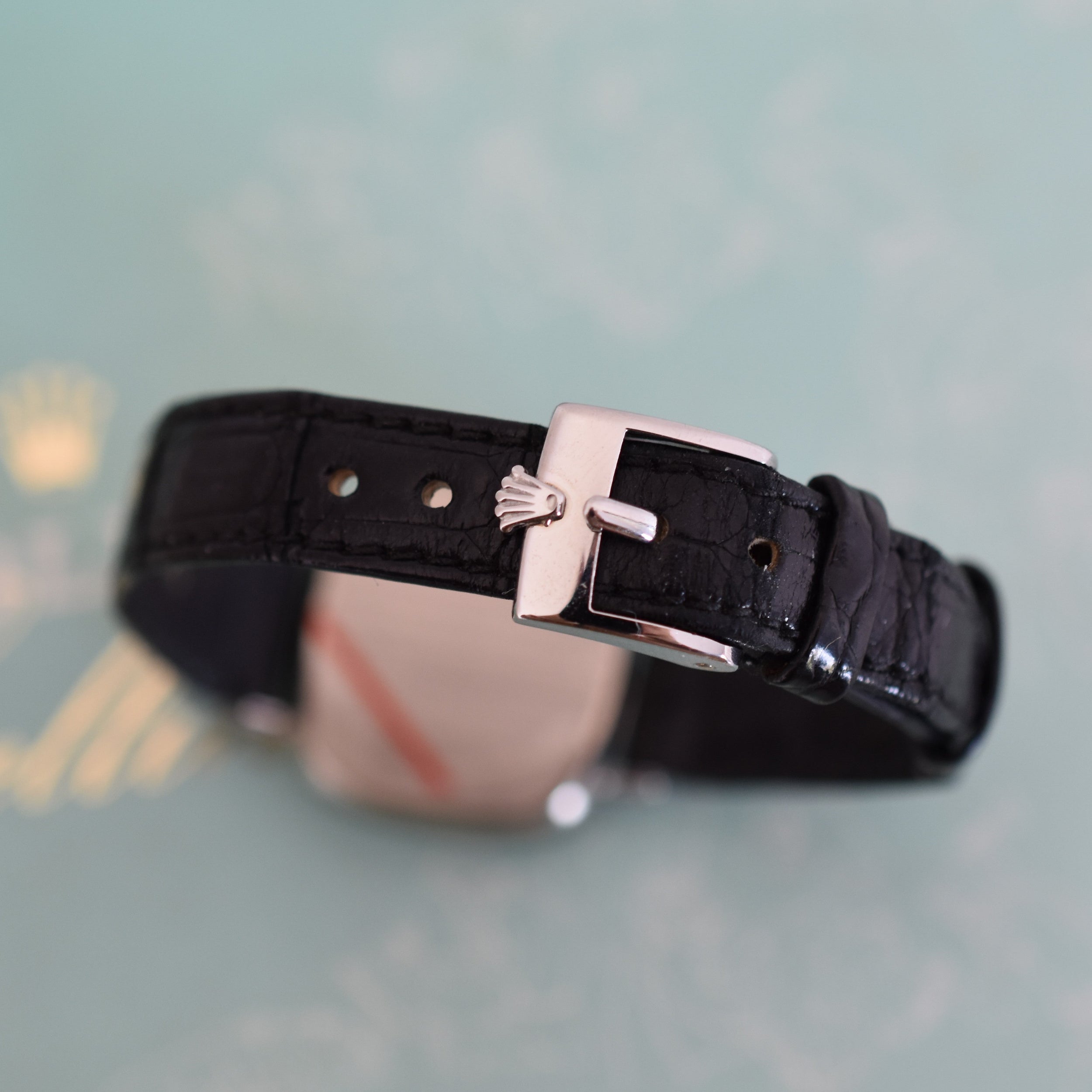 Montre ROLEX "Cellini Zephir" en or blanc, acier, cuir et rubis