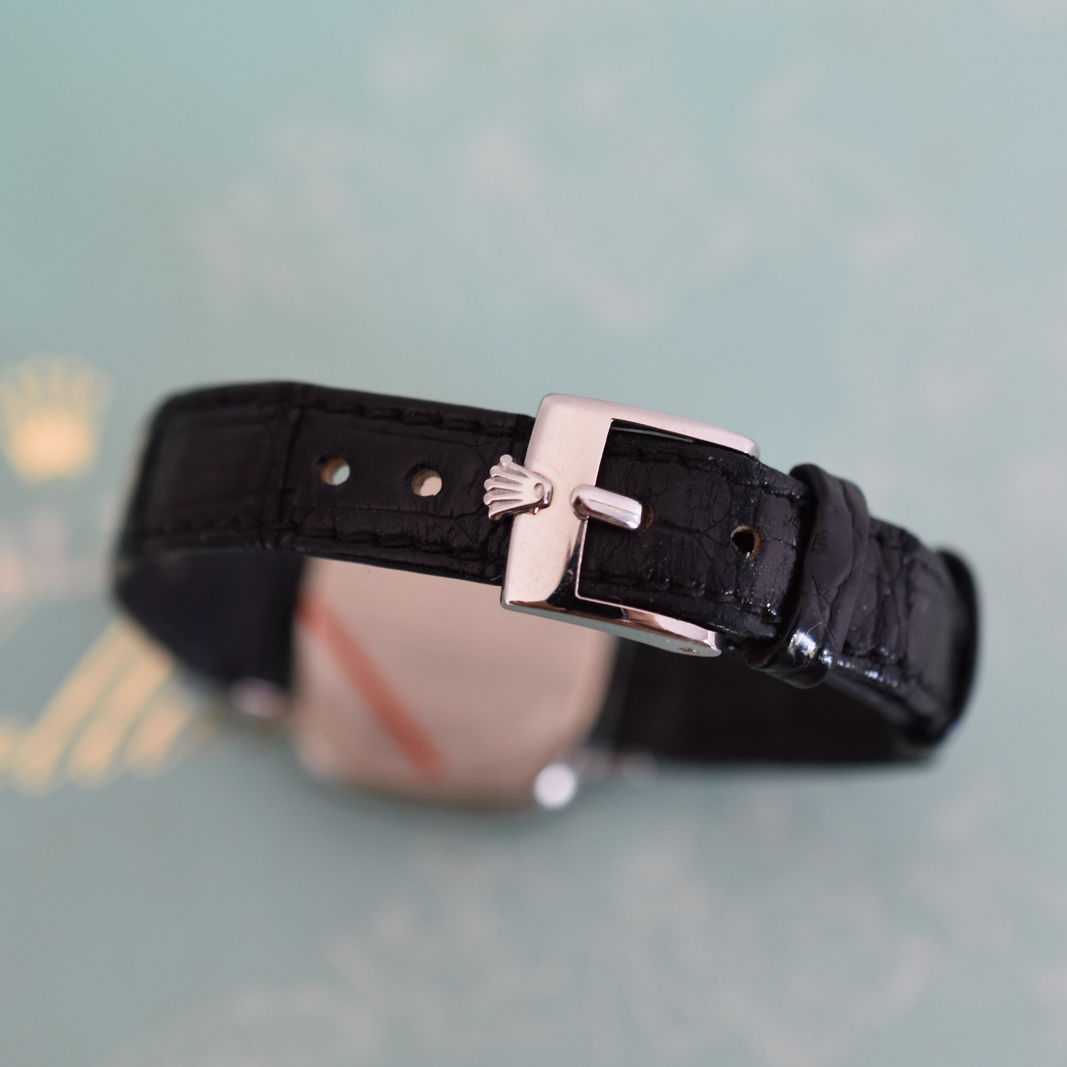 Montre ROLEX "Cellini Zephir" en or blanc, acier, cuir et rubis