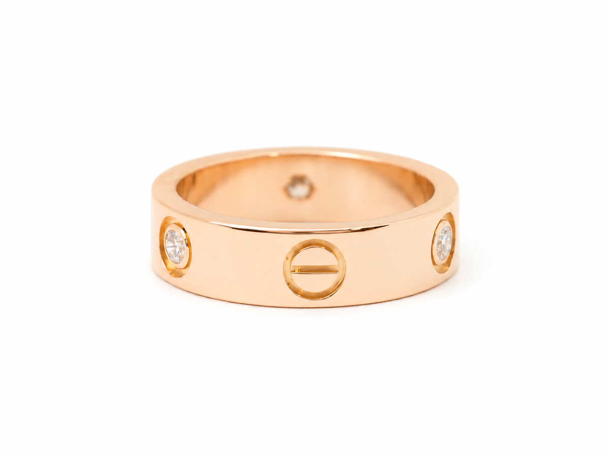 Bague Alliance CARTIER Love en or rose et diamants