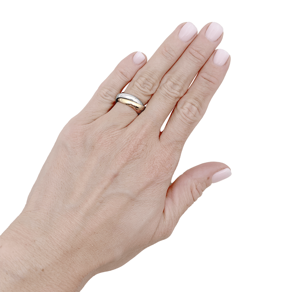 Bague Cartier, modèle "Trinity", trois tons d'or.
