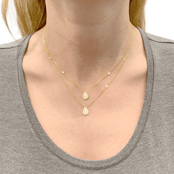 Collier Edouard NAHUM, or jaune et diamants.