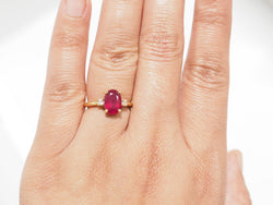 Bague Solitaire en or jaune, rubis et diamants