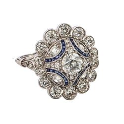Bague Entourage en platine, saphirs et diamants