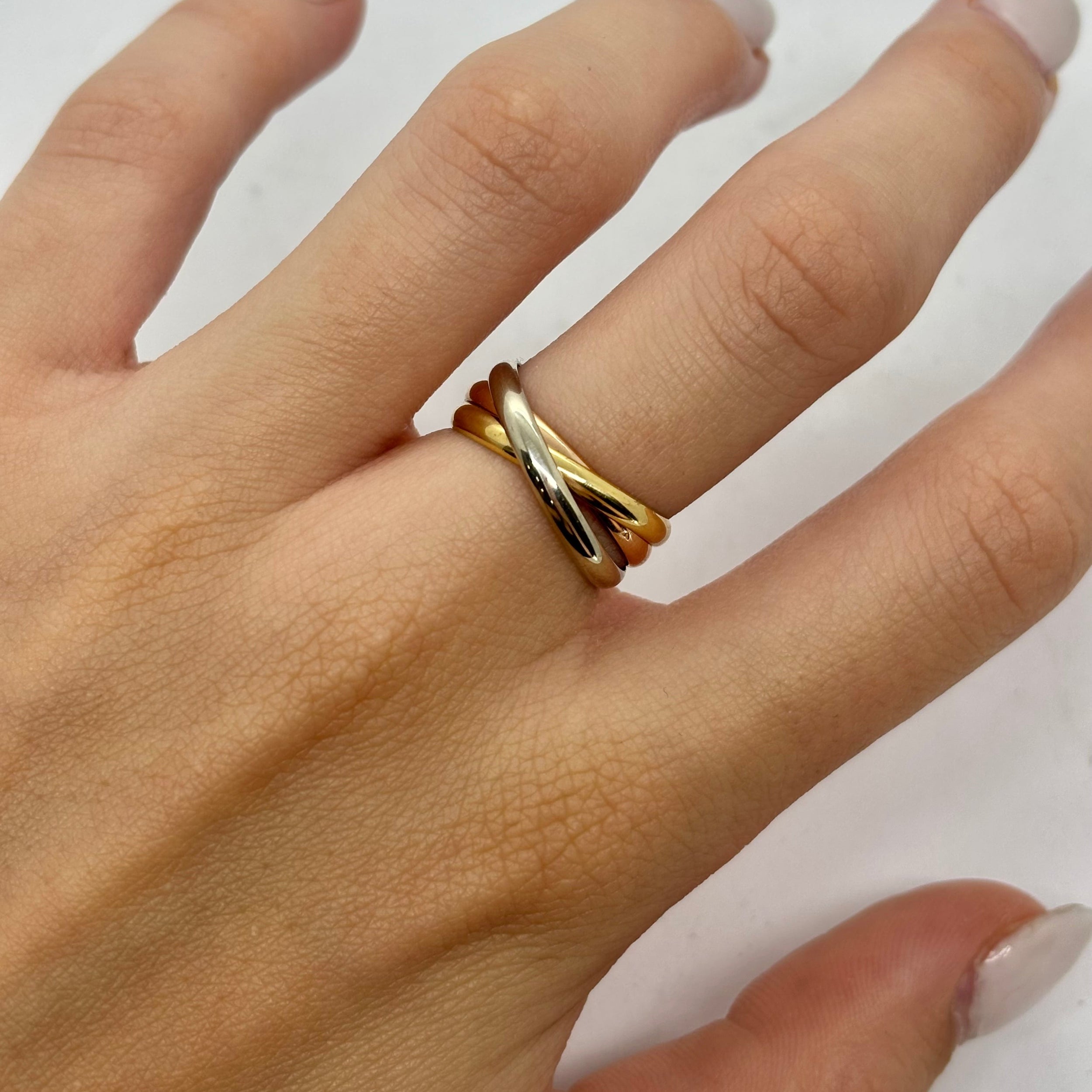 Bague Alliance CARTIER "Trinity" en or blanc, or rose, et or jaune
