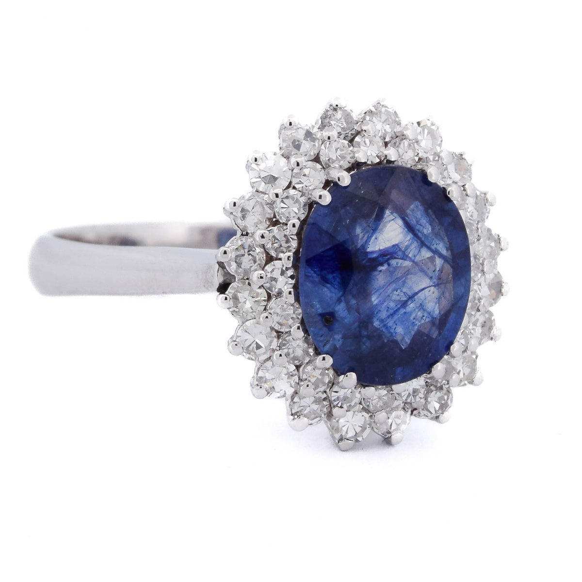 Bague Entourage en or blanc, saphir et diamants